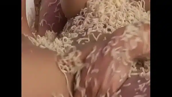 Asian cocksucker gets her pussy stuffed with noodles and dick