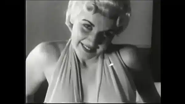 Sexy blonde takes off her underwear and shows beautiful breasts